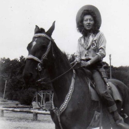 Black And White Photo Of A Woman On A Horse
