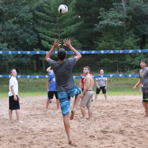 Group Of People Playing Volleyball